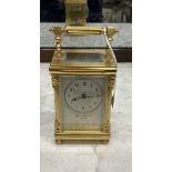 Clocks: Brass carriage clock dial signed Mappin & Webb, the chamfered front pillars with applied