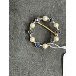 Hallmarked Jewellery: Open circular brooch set with six 3.5mm cultured pearls alternating with six