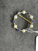 Hallmarked Jewellery: Open circular brooch set with six 3.5mm cultured pearls alternating with six