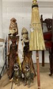 Mid 20th cent. Japanese rod puppets. 29½ins. x 26ins. Plus a pair of Indonesian lion dogs, 10ins and