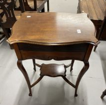 Edwardian ladies writing desk the shaped mahogany moulded top opening to reveal a fold out writing