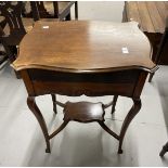 Edwardian ladies writing desk the shaped mahogany moulded top opening to reveal a fold out writing
