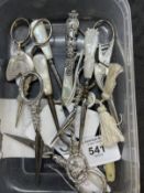 Objects of Vertu: White metal scissors, a cockerel and heron, two ornate pairs embroidery scissors