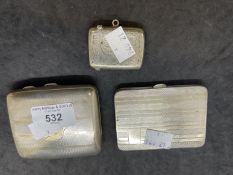 Hallmarked Silver: Two cigarette cases and one Vesta case. Total weight 6.8oz.