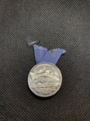 OCEAN LINER: S.S. NORMANDIE souvenir Blue Ribbon pin, circa 1935, a rare piece that was presented to