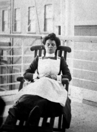 R.M.S. TITANIC: Rare original photograph of Titanic stewardess Annie Martin in uniform, reposing