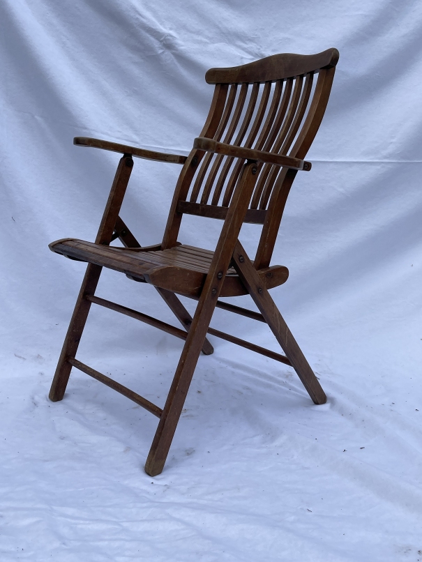 SHIPPING: 20th century teak slat back steamer chair.