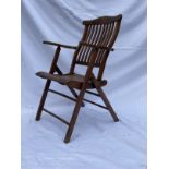 SHIPPING: 20th century teak slat back steamer chair.
