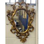 20th cent. Gilt framed mirror, organic carved frame.