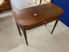 Early 19th cent. Mahogany tea table on turned ring supports. 35¼ins. x 17¼ins. x 34½ins.