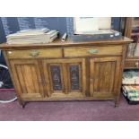 19th cent. Art style oak sideboard with two drawers above three doors. Approx. 60ins. x 20ins. x