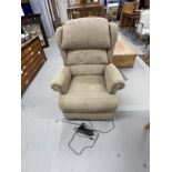 Electric reclining armchair, beige upholstery.