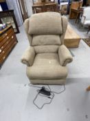 Electric reclining armchair, beige upholstery.