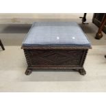 19th cent. Oak carved footstool on paw feet supports. Approx 26ins. x 26ins. x 15ins.