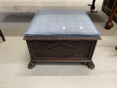 19th cent. Oak carved footstool on paw feet supports. Approx 26ins. x 26ins. x 15ins.