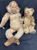 Toys: Continental mohair teddy bear, glass eyes (one loose), black wool nose, straw filled. Wear