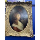 19th cent. English School: Oil on canvas head and shoulders portrait of a young woman wearing a