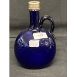 19th cent. Bristol Blue handled flagon decanter, white metal plated rim, no stopper. Height 7½ins.