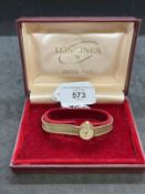Watches: Ladies 9ct gold hallmarked Longines with integral bracelet, round 15mm case with ivory