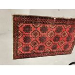 Carpets & Rugs: 20th cent. Turkman rug, red ground, three borders, eighteen full guls, all in
