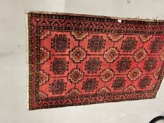 Carpets & Rugs: 20th cent. Turkman rug, red ground, three borders, eighteen full guls, all in