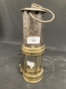 Miners Safety Lamps: Late 19th cent. Unmarked example, stamped 18G on the reservoir. 10ins.