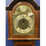 Clocks: 20th cent. Mahogany cased Tempus Fugit short case clock, arched top, German movement. 65ins.