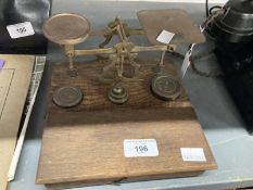 Scientific Instruments: 20th cent. Brass postal scales and a hanging balance. (2)