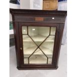 Late 18th cent. Mahogany corner cupboard, dental cornice above a small satinwood inlaid rectangle,