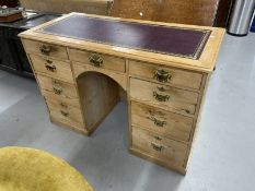 19th cent. Pine nine drawer knee hole desk with brass handles. 48½ins. x 23ins. x 33ins.