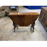 19th cent. Burr walnut Sutherland table on brass and ceramic castors. Approx. 41ins. x 36ins (when