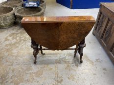 19th cent. Burr walnut Sutherland table on brass and ceramic castors. Approx. 41ins. x 36ins (when