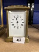 Clocks: French brass carriage clock, white enamel face, Roman numerals. 4½ins.