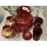 Cranberry and gilt glass vases, a pair, plus six other cranberry and glass items.