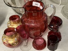 Cranberry and gilt glass vases, a pair, plus six other cranberry and glass items.