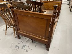 Late 19th/early 20th cent. Mahogany bed with square moulded panels flanked by turned columns, slight