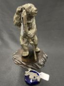 20th cent. White metal standing bear with staff, height 9½ins. and treen stand. Plus white metal and