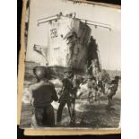 Militaria: WWII photographs, thirty 15ins. x 12ins. photographs depicting scenes of Allied troops