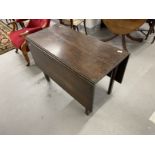 Early 19th cent. Oak drop leaf table, rectangular top supported by square chamfered legs. 26½ins.