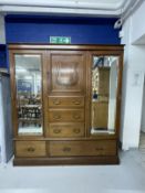 20th cent. Arts and Crafts mahogany, mirror fronted wardrobe by John Taylor & Son of Edinburgh,