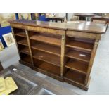 Victorian walnut breakfront bookcase each of the three sections having three adjustable shelves,