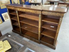 Victorian walnut breakfront bookcase each of the three sections having three adjustable shelves,