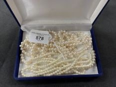 Jewellery: Necklet, single row of cultured pearls. Length 36ins. Plus necklet, single row of