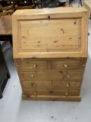 Modern pine bureau, the fall front over two short and three long drawers, the interior having two