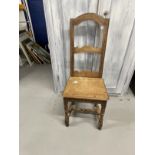 19th cent. Oak country chairs, shaped top rail, open backs with shaped bar across solid seats,