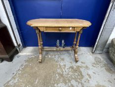 19th cent. Satinwood side table with drawer, on four shaped supports above china castors.