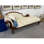 19th cent. Mahogany cream upholstered chaise on brass castors.