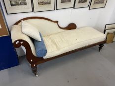 19th cent. Mahogany cream upholstered chaise on brass castors.