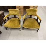 20th cent. Wheel back chairs, a pair, and a mahogany tripod table, approx. 20ins. x 28ins. 20th