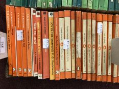 Books: 1950s/60s Penguin Fiction Library (orange) paperbacks. Twenty titles, nine by P.G.